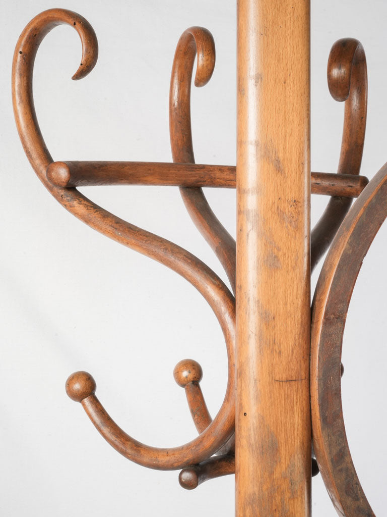 Charming period-piece coat hanger