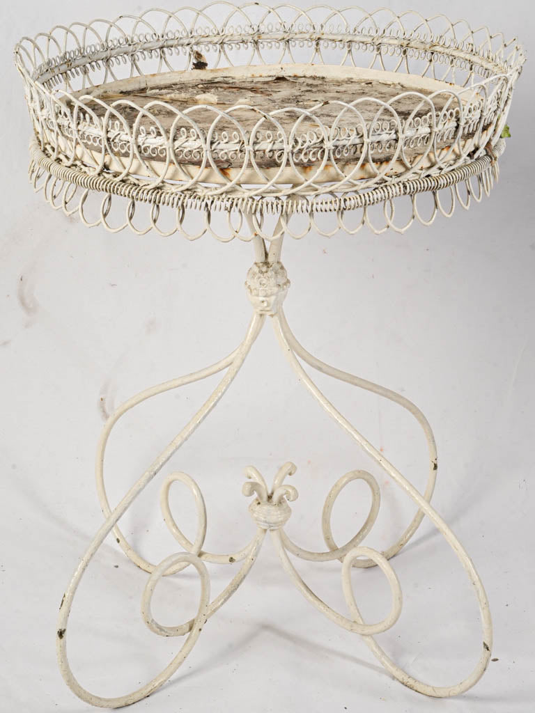Chipped finish iron décor piece  