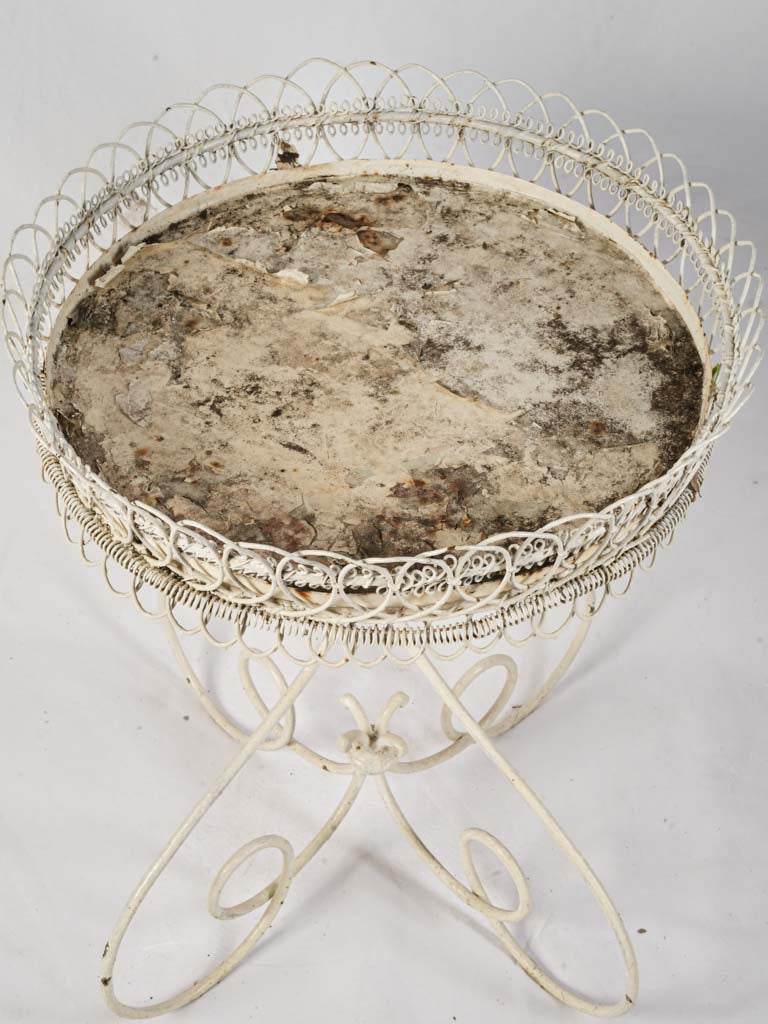 Romantic scrolling iron plant stand  