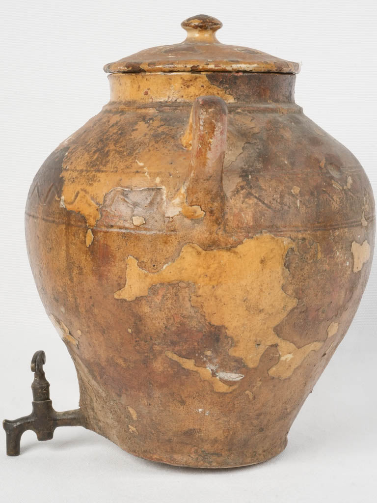 Authentic aged terracotta grape harvest jar
