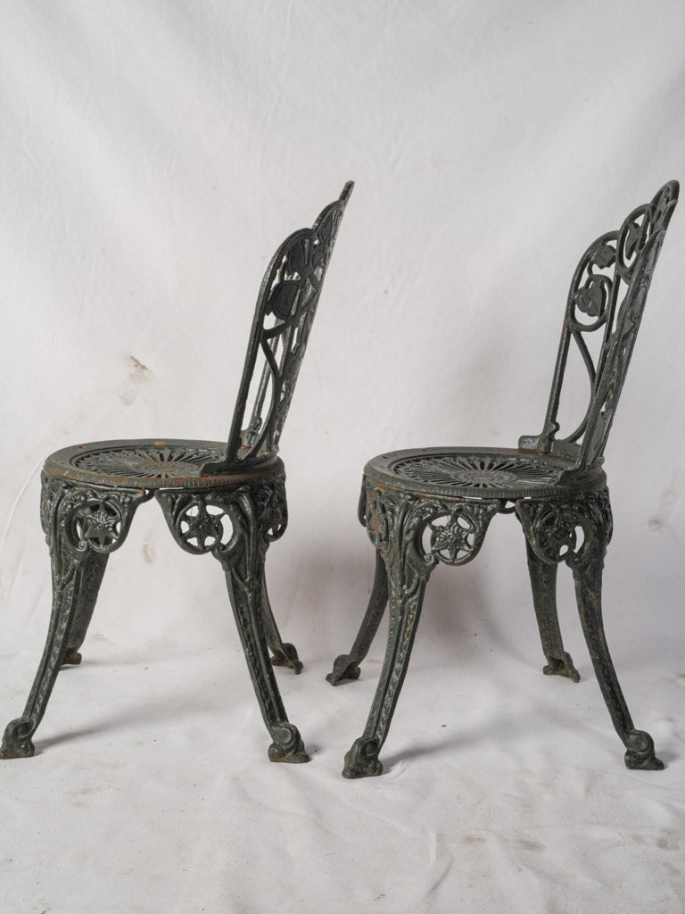 Intricate sunburst pattern iron chairs