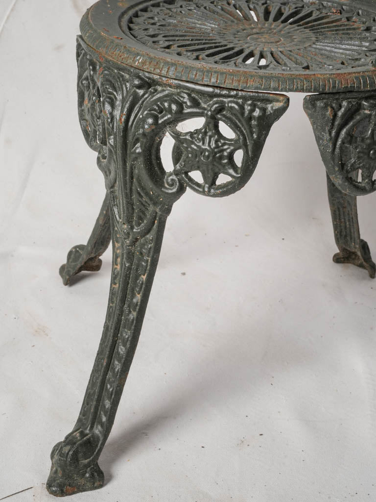 Vintage ornate cast iron chairs