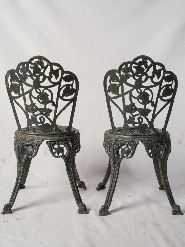 Weathered patina outdoor iron chairs