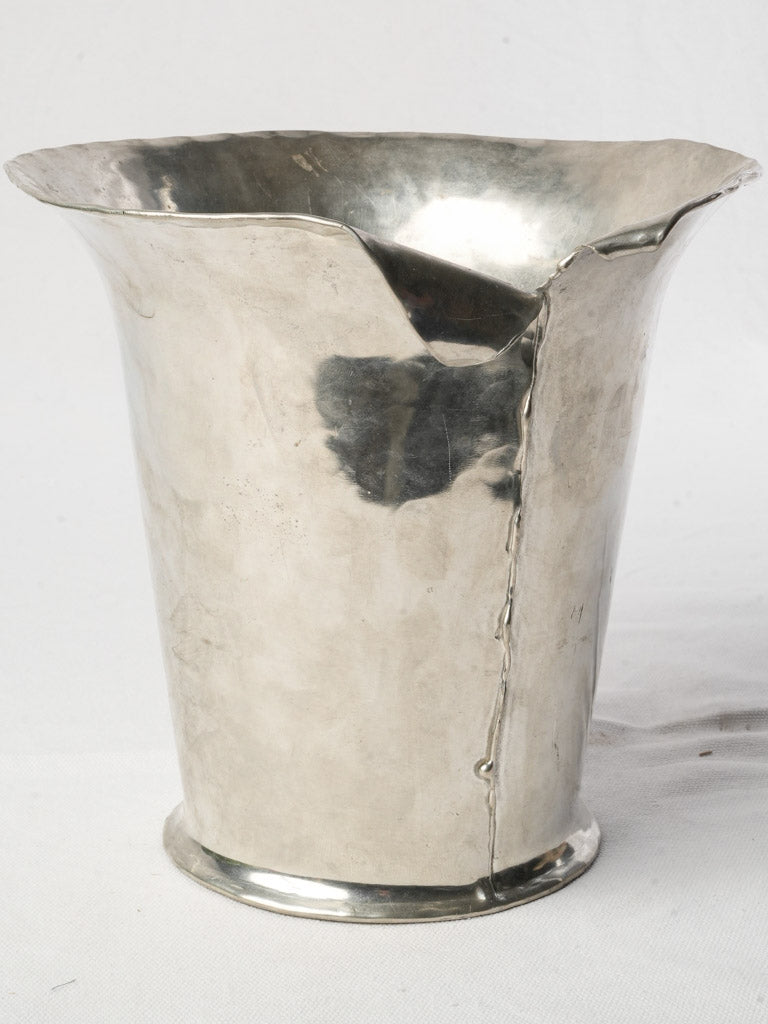 Mid-century artistic pewter vessel