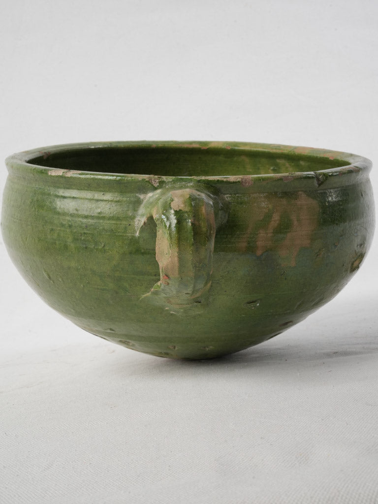 Rustic earthenware fruit colander