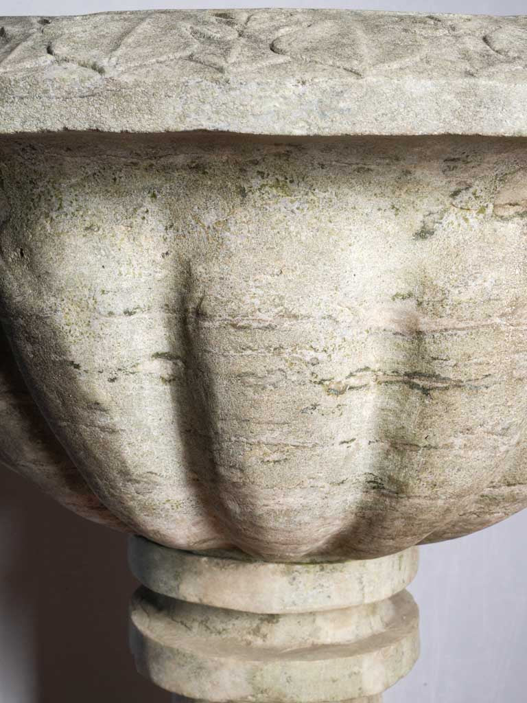Graceful fluted architectural fountain feature