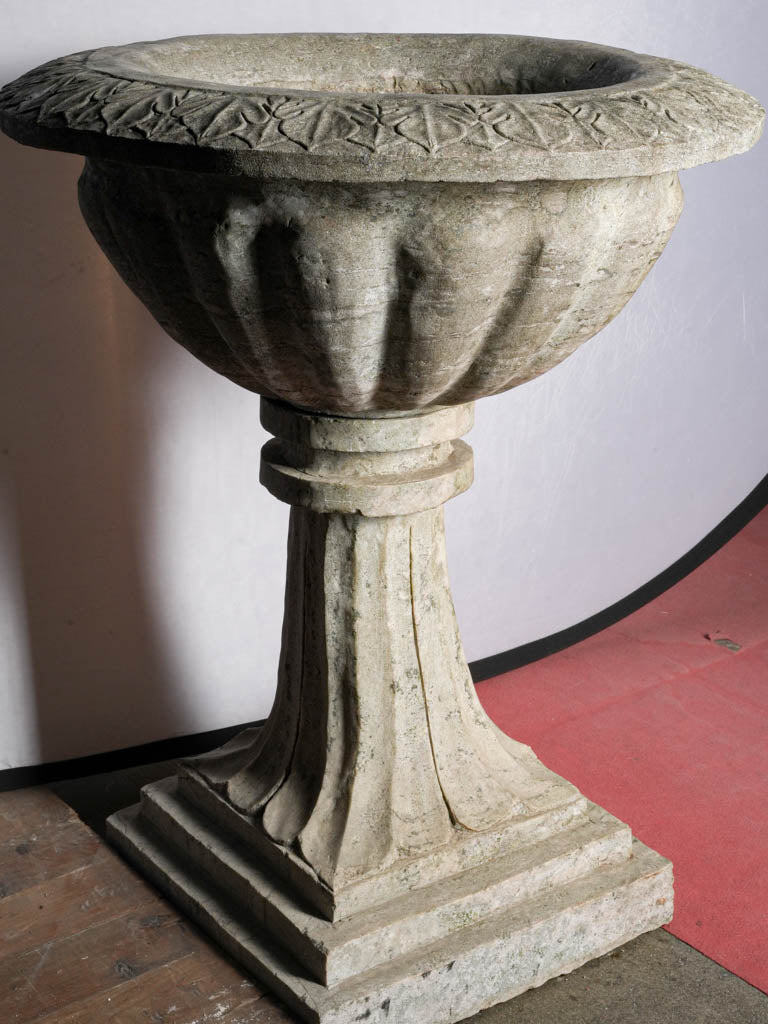 Decoratively carved foliate motif basin