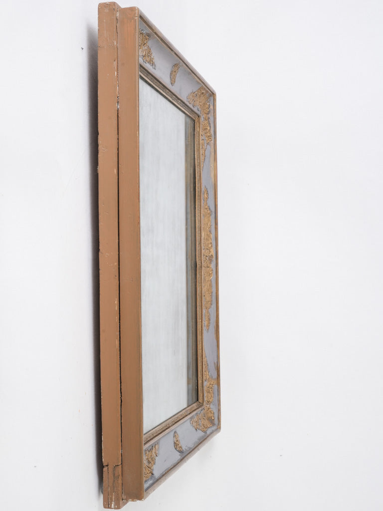 Gilt floral adorned French mirror