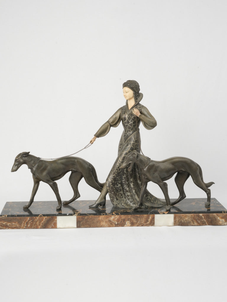 Ornate patinated regule woman figure