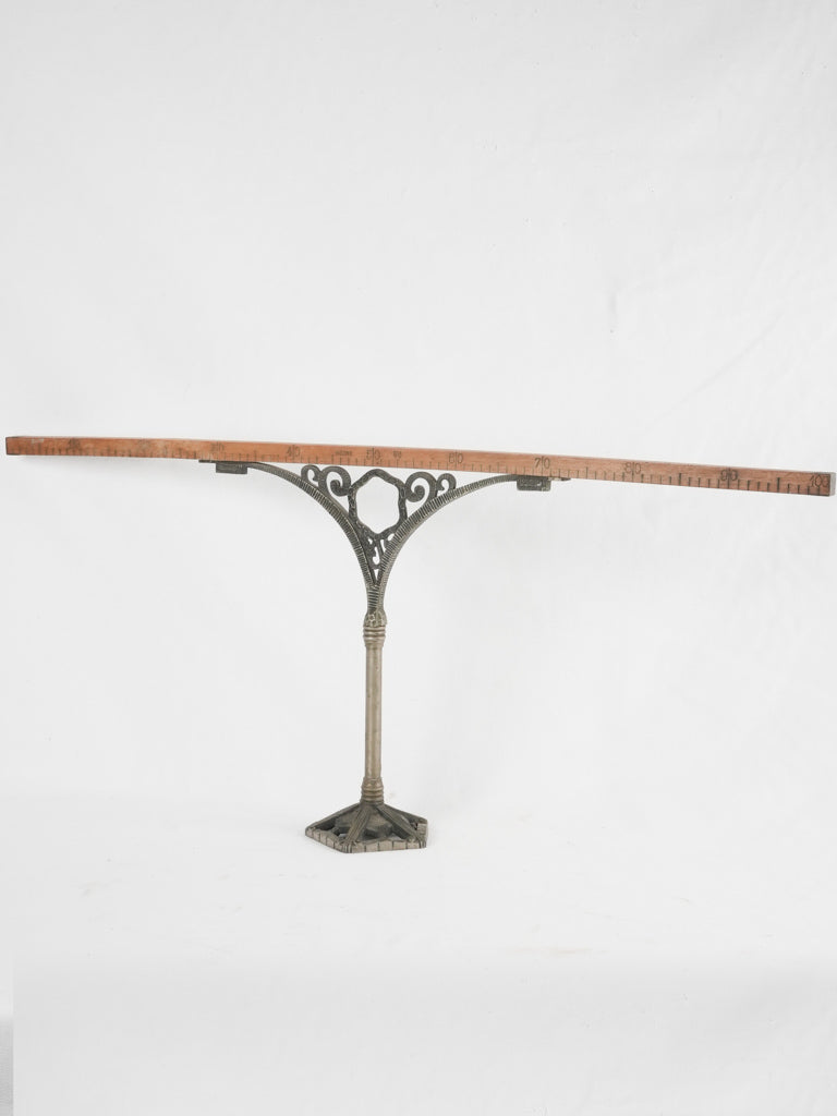 Vintage Art Deco cast iron measure