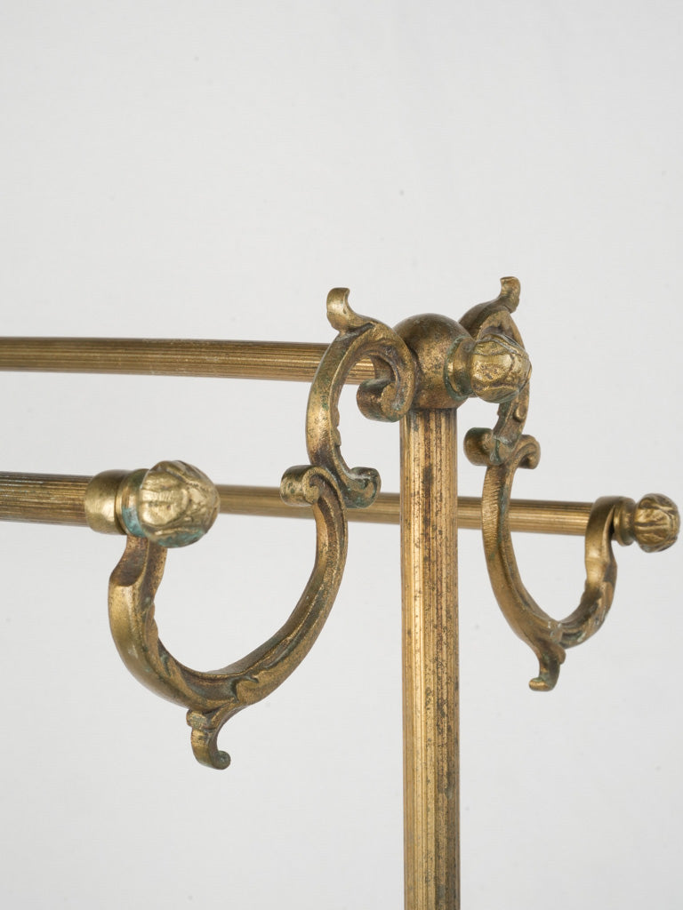 Ornate brass towel rack