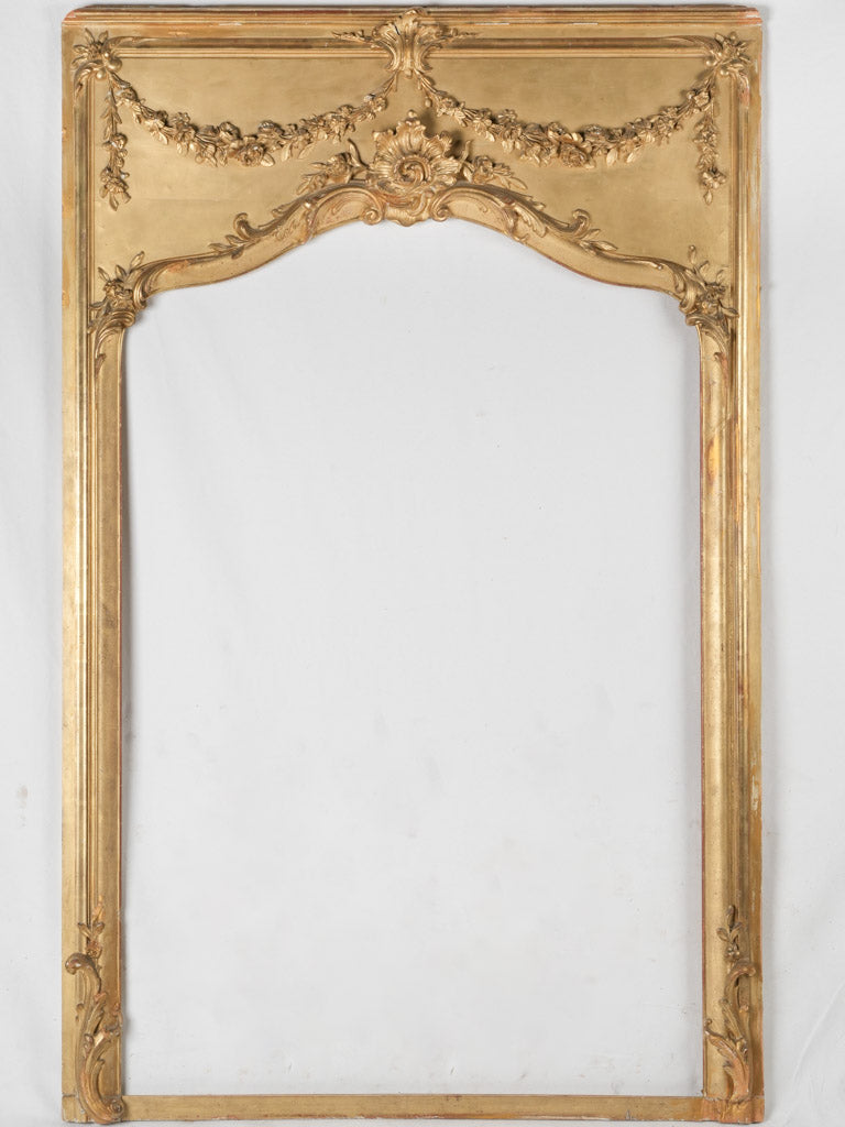 Ornate, gilded Louis XIV-style frame