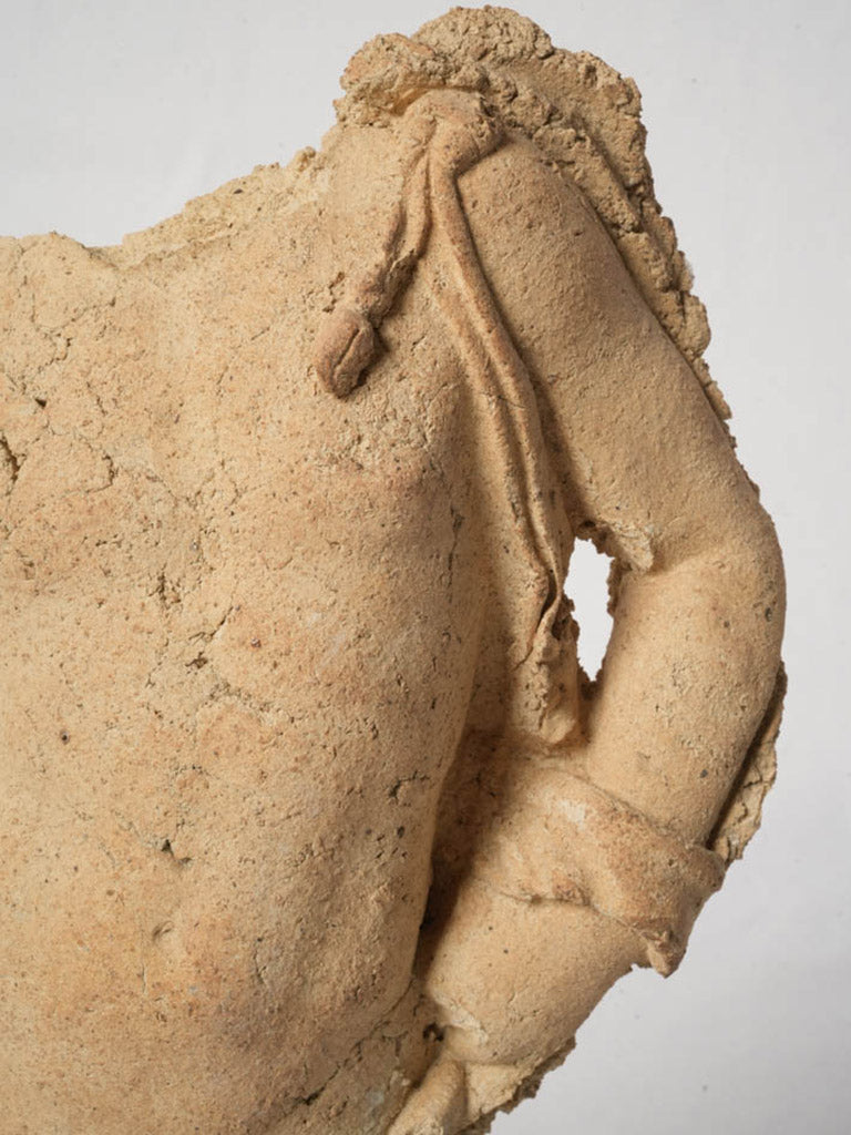 Archaeological-style male torso art