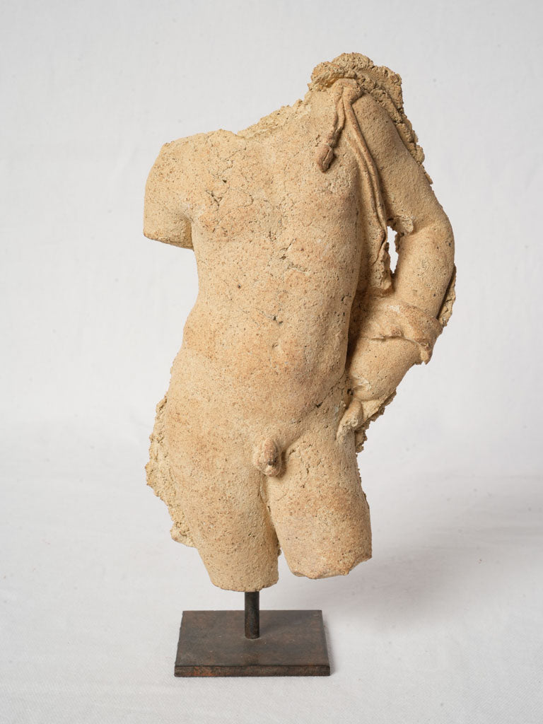 Sand-toned contemporary torso statue