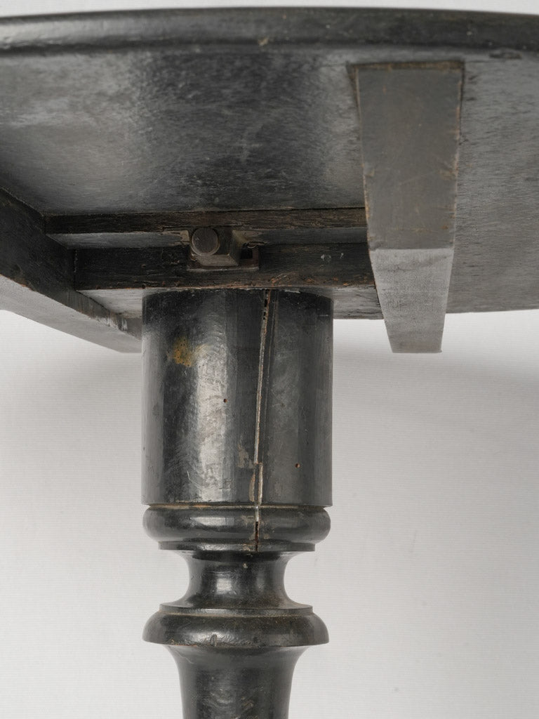 Aged, practical wooden tripod base accent table