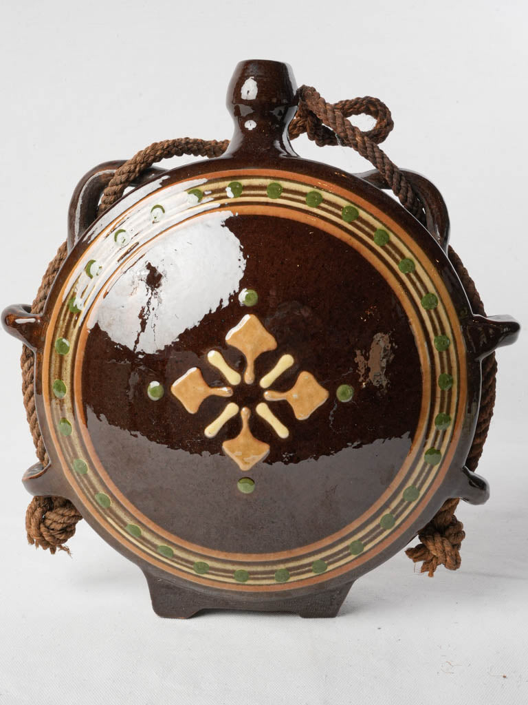 Decorative floral motif ceramic flask