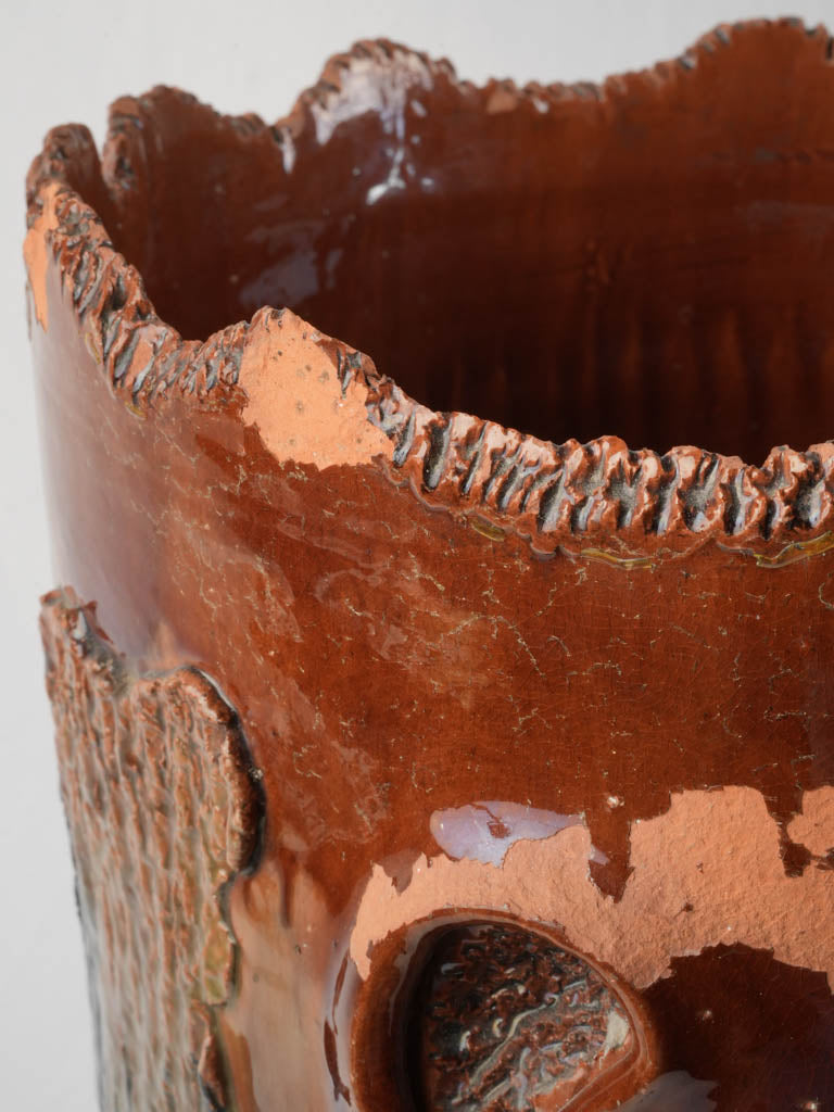 Earth-toned artistic umbrella holder