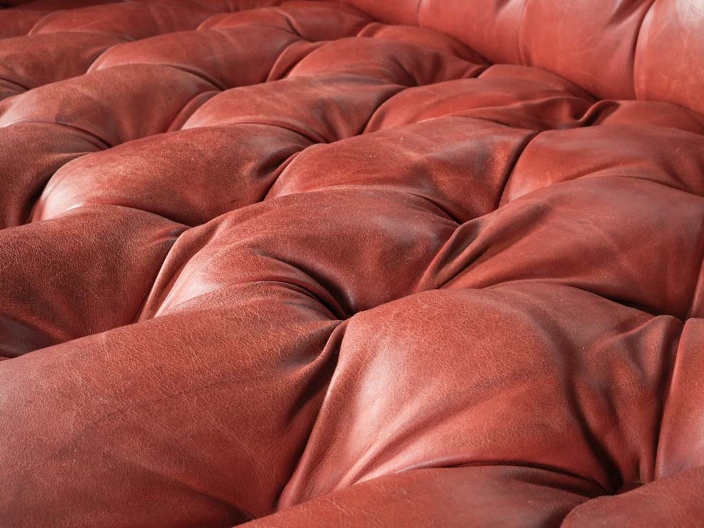 Warm antique leather armchair