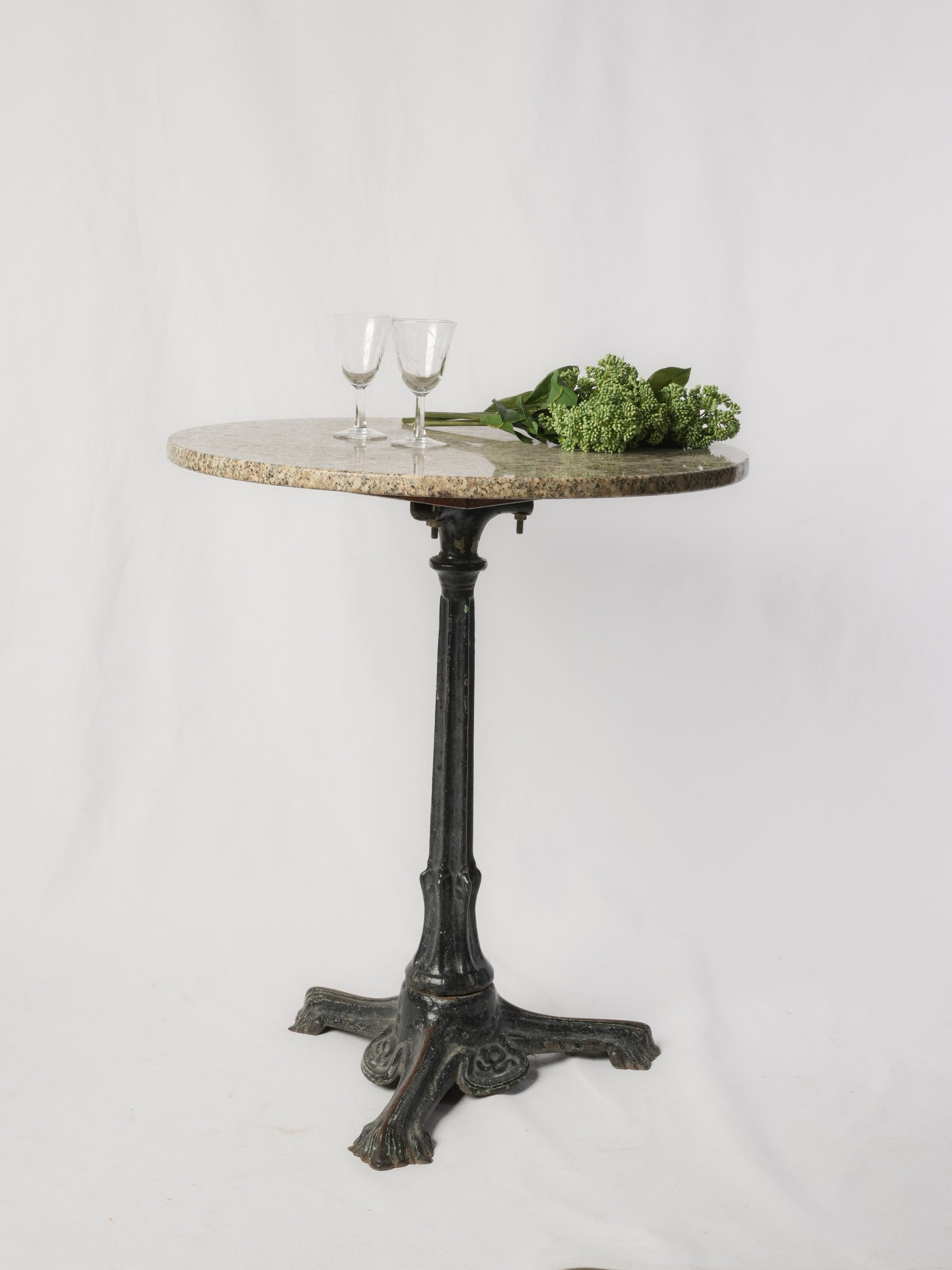 Timeless Bistro-Style Table w/ Art Nouveau Cast Iron Base and Polished Granite Top - 24½" diam.