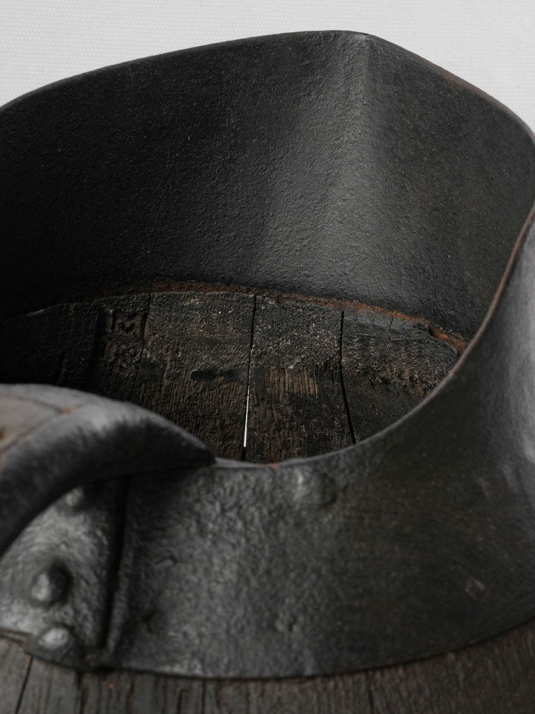 Patina-rich iron-bound pitcher