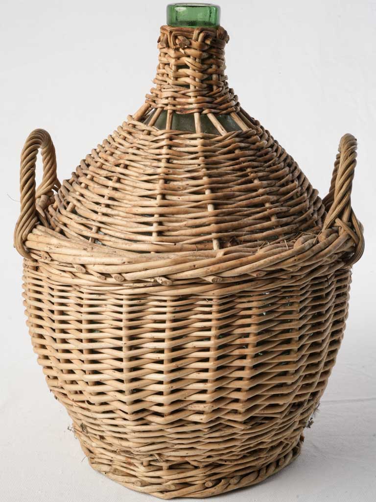 Vintage handcrafted green glass demijohn