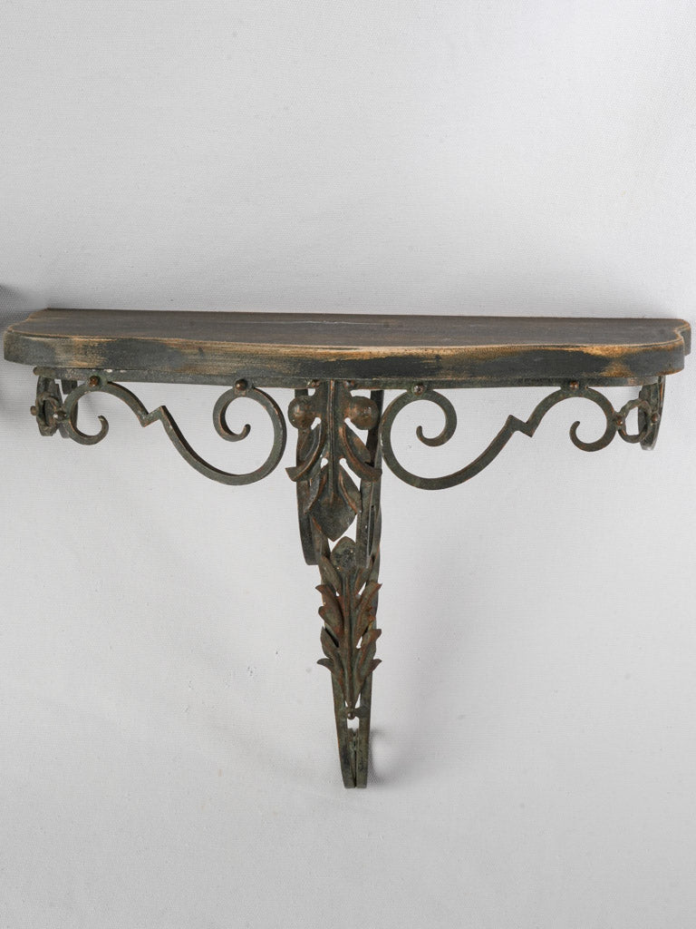 Graceful scrolling iron wall brackets