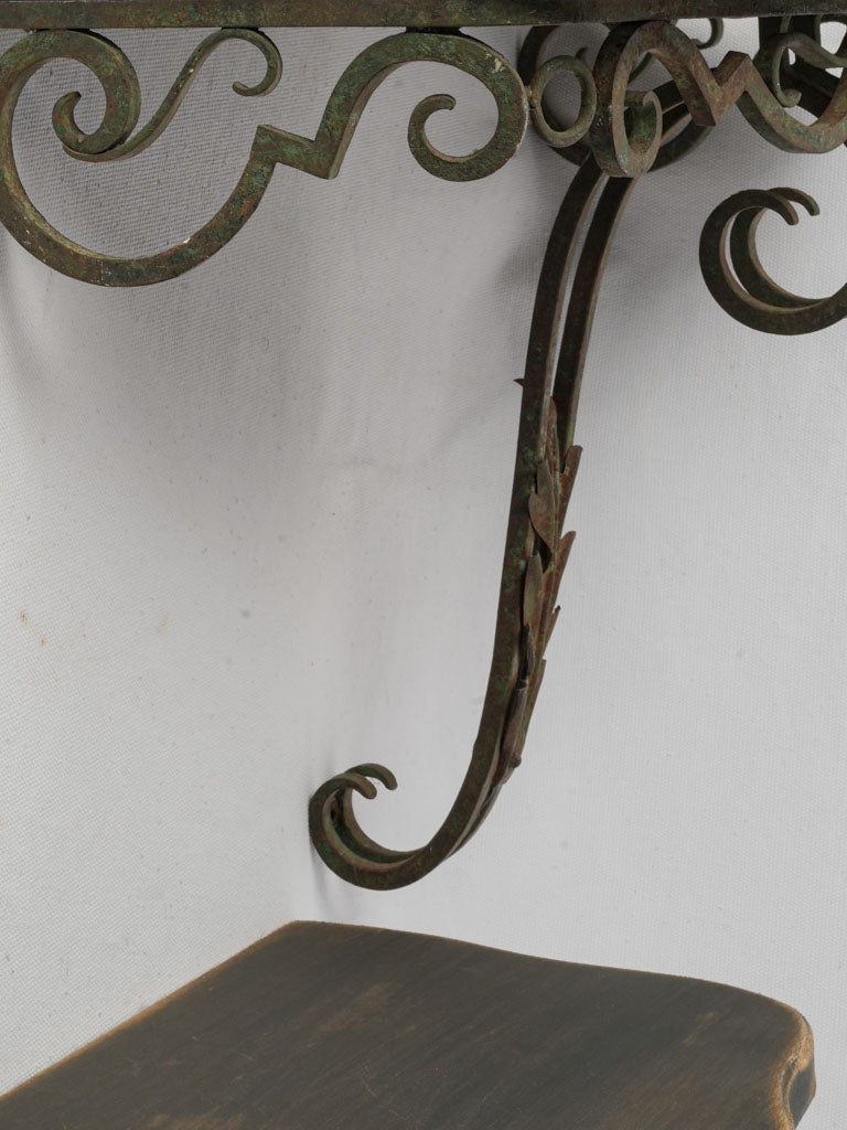 Subtly varied wrought ironwork brackets