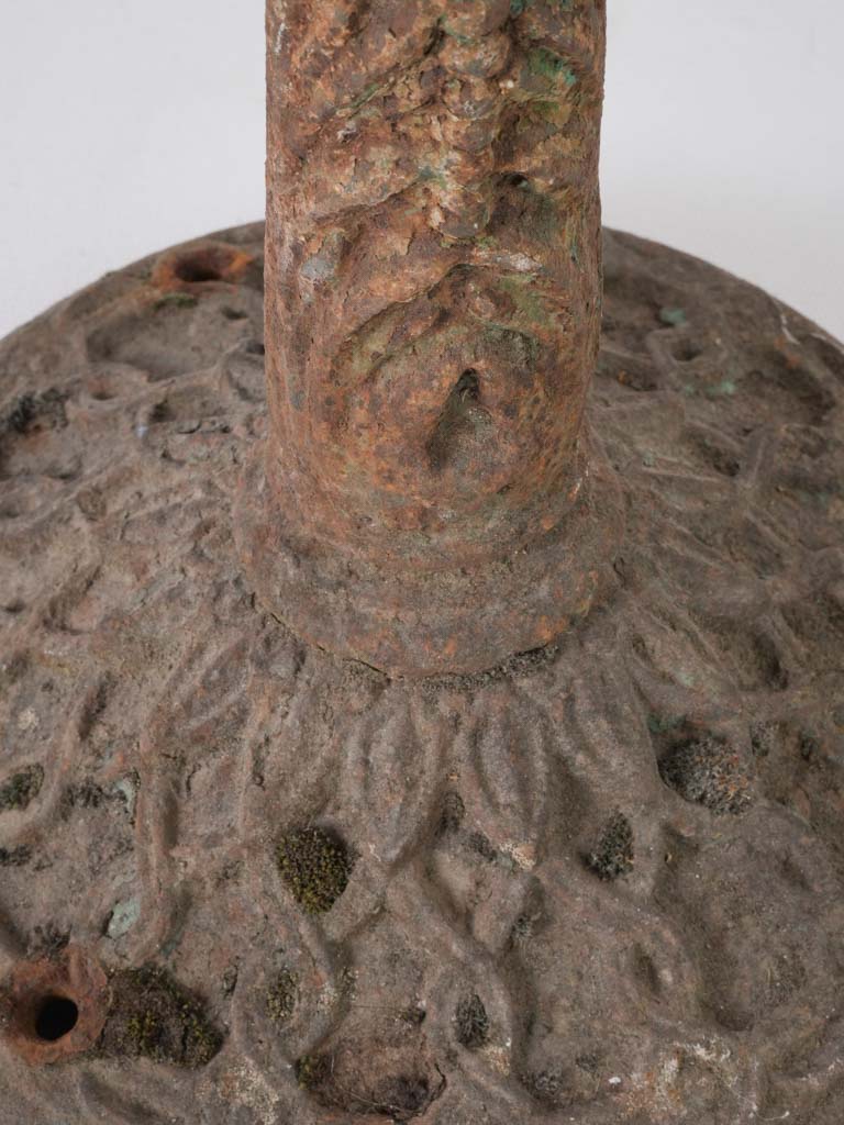 Patina-finished outdoor round table