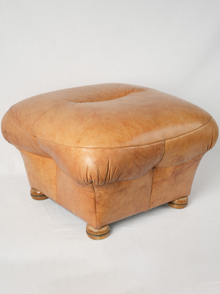 Distinctive 1980s tan leather footstool