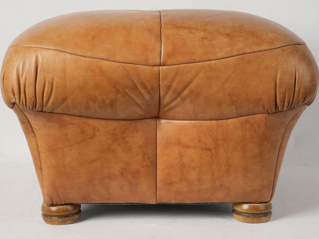 Plump tan leather footrest