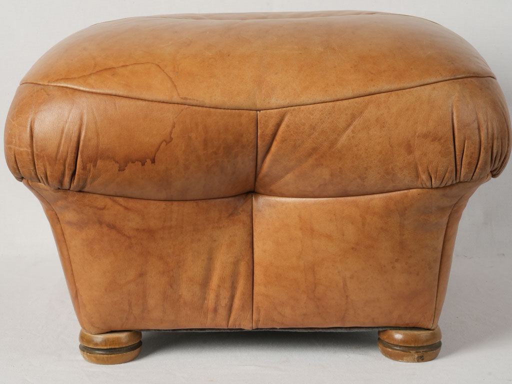 Warm vintage Italian leather pouf