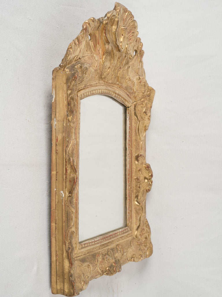Elegant scalloped shell crest mirror