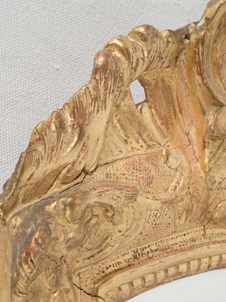 Intricate foliate scrollwork mirror