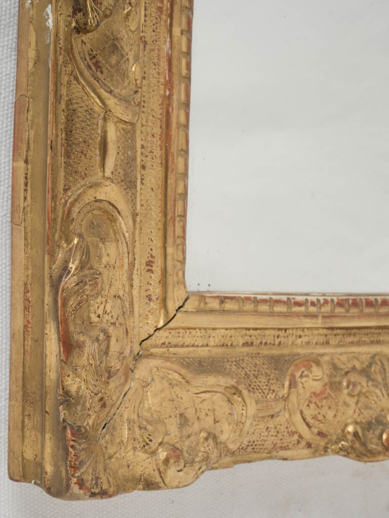 Textured floral motif mirror