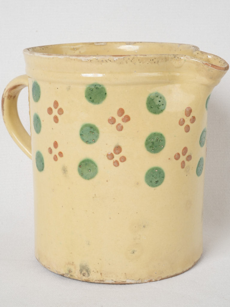 Antique yellow spotted slipware pitcher