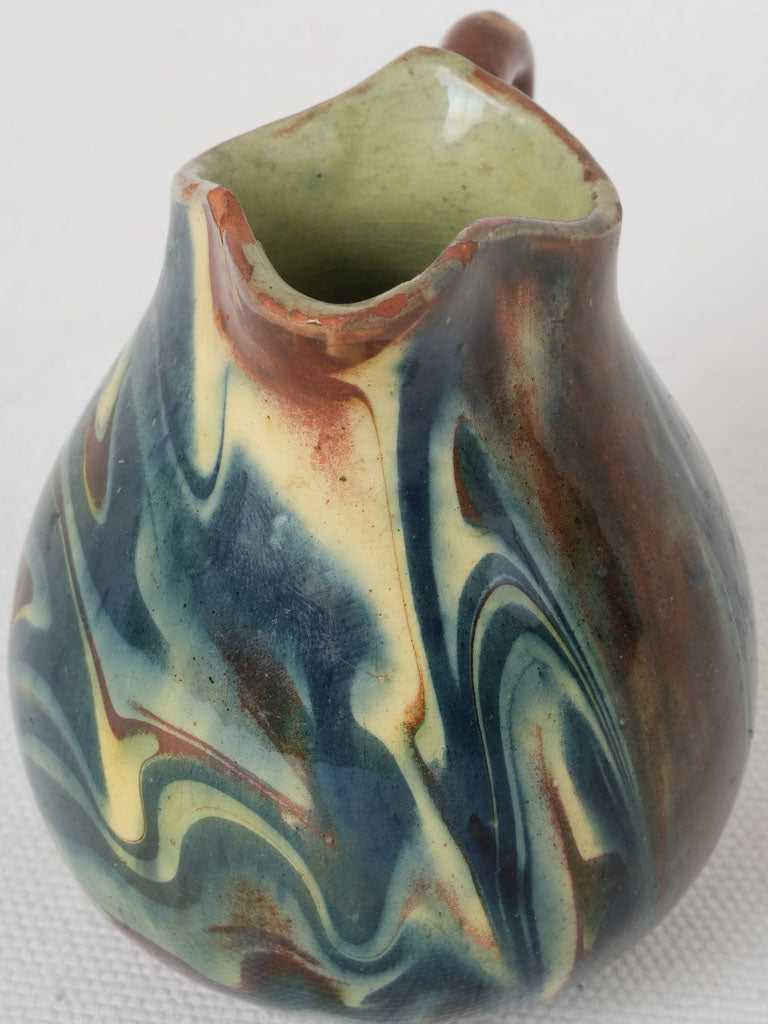 Weathered alpine region pottery pitcher
