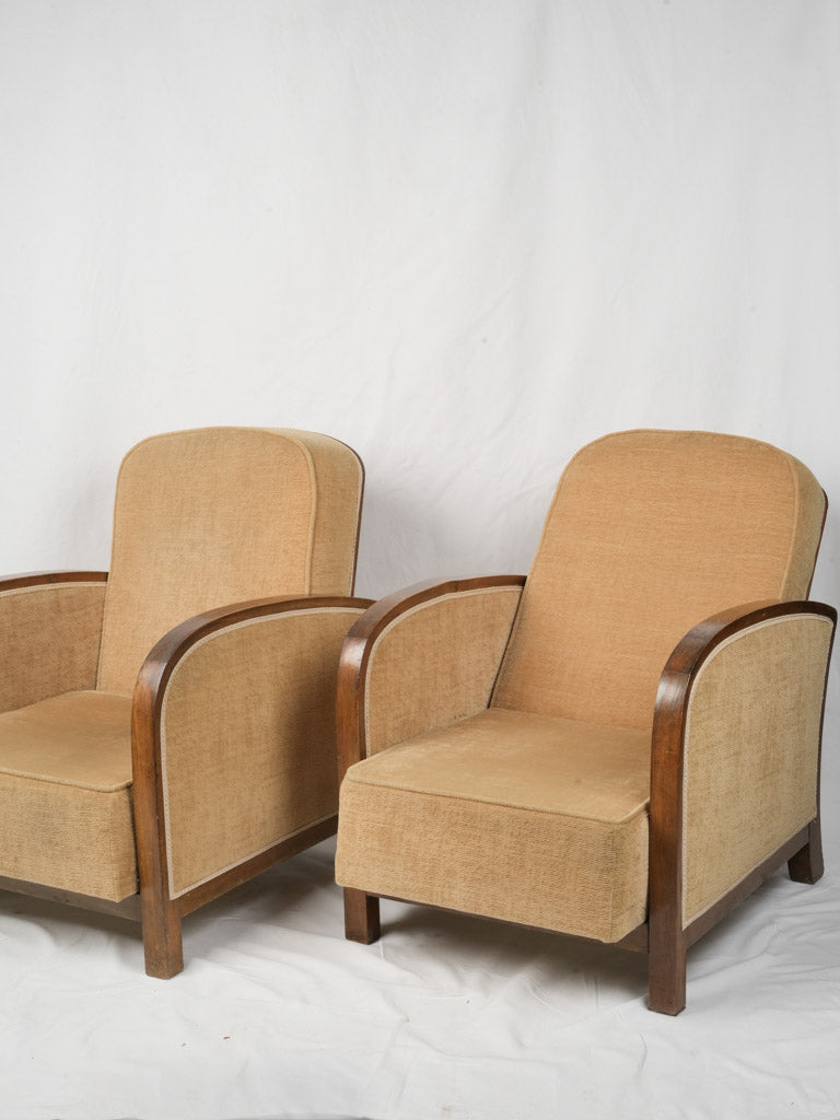 Chic champagne-tone upholstered chairs