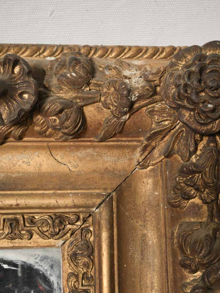 Richly carved scrolling mirror frame