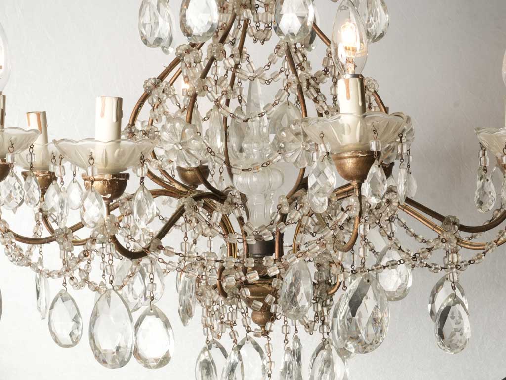 Ornate chandelier with gilded bronze - opulent, historic