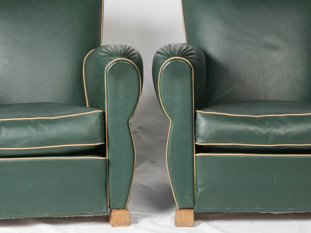 Retro mustache-back leather armchairs