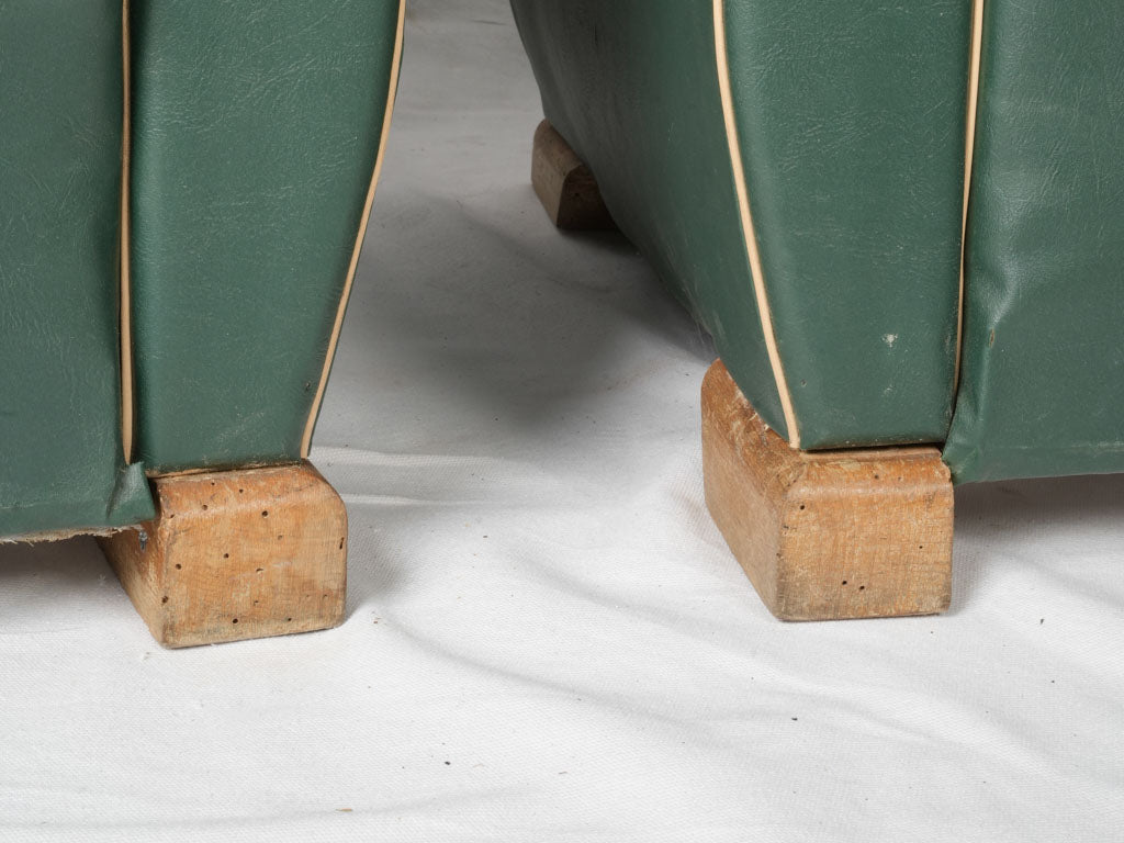 Inviting vintage green club chairs
