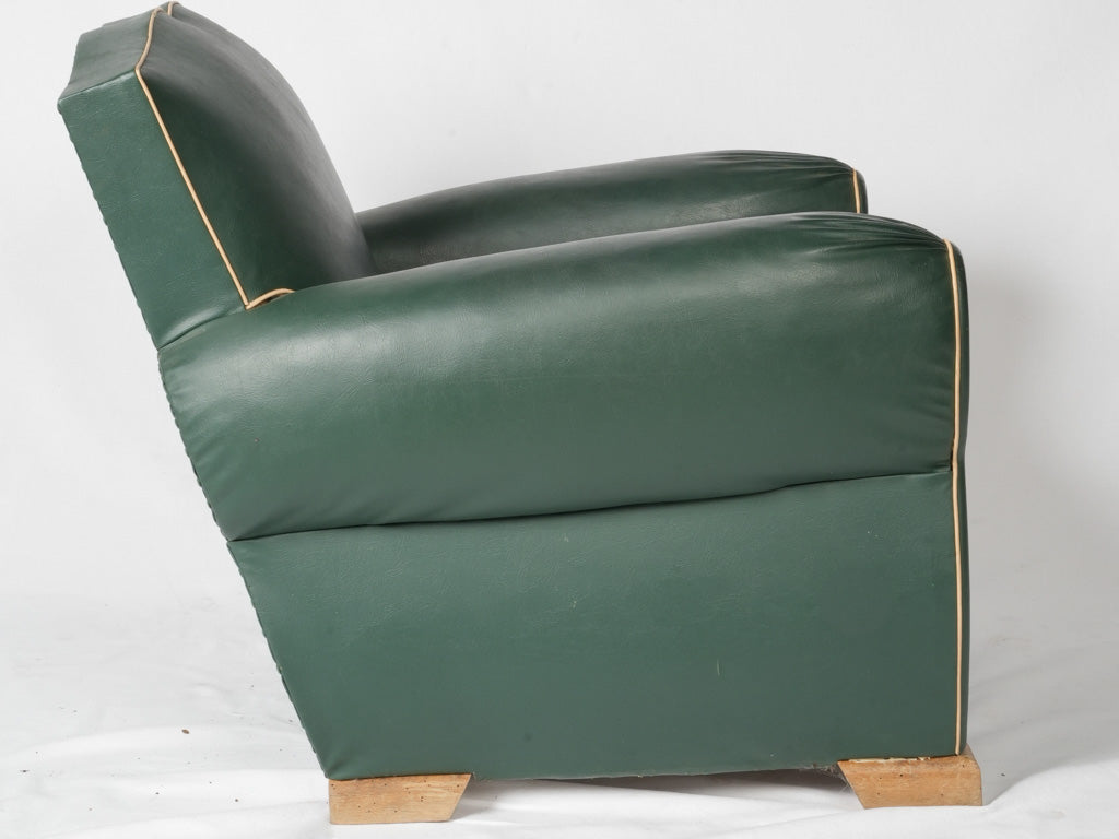 French-inspired faux leather club chairs
