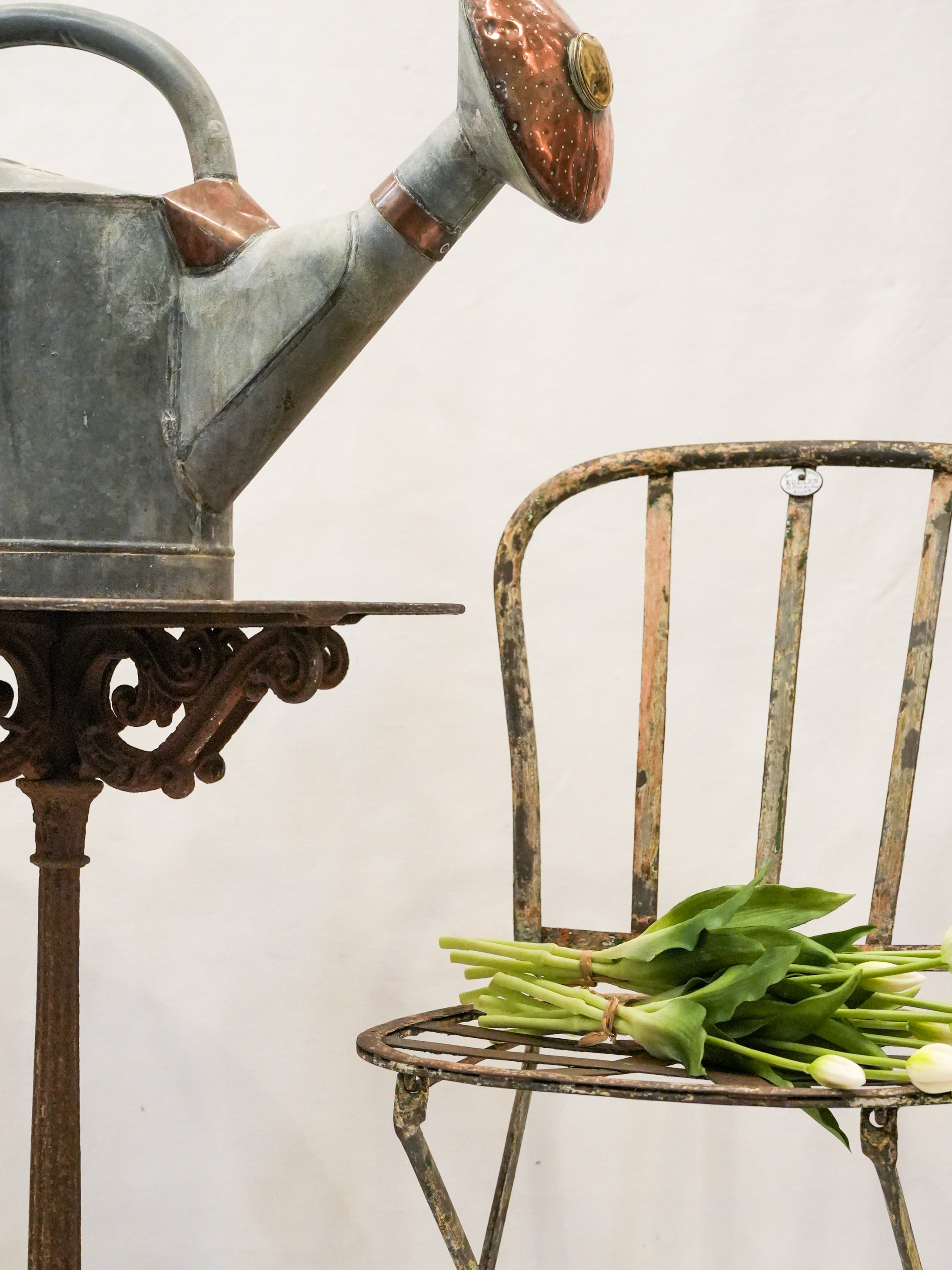 Aged French metal outdoor chairs