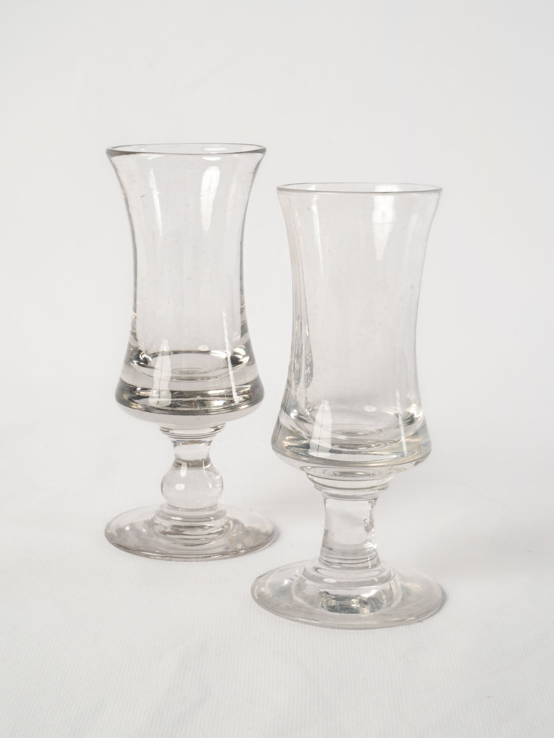 Near pair of French antique blown glass absinthe bistro glasses