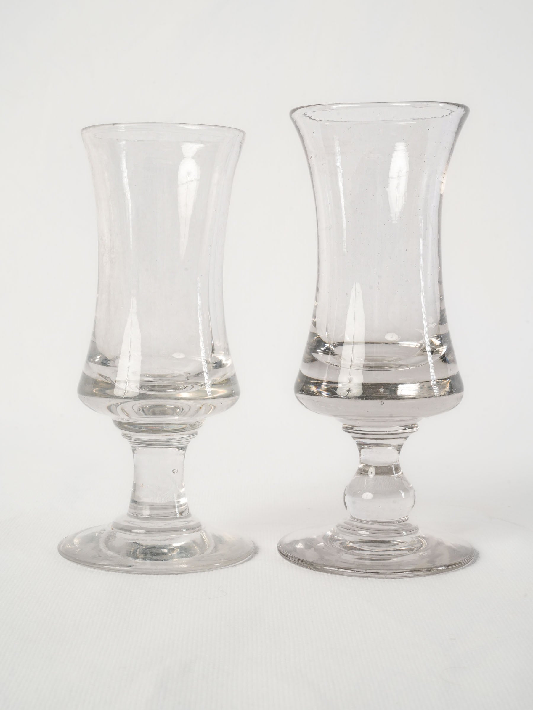 Near pair of French antique blown glass absinthe bistro glasses