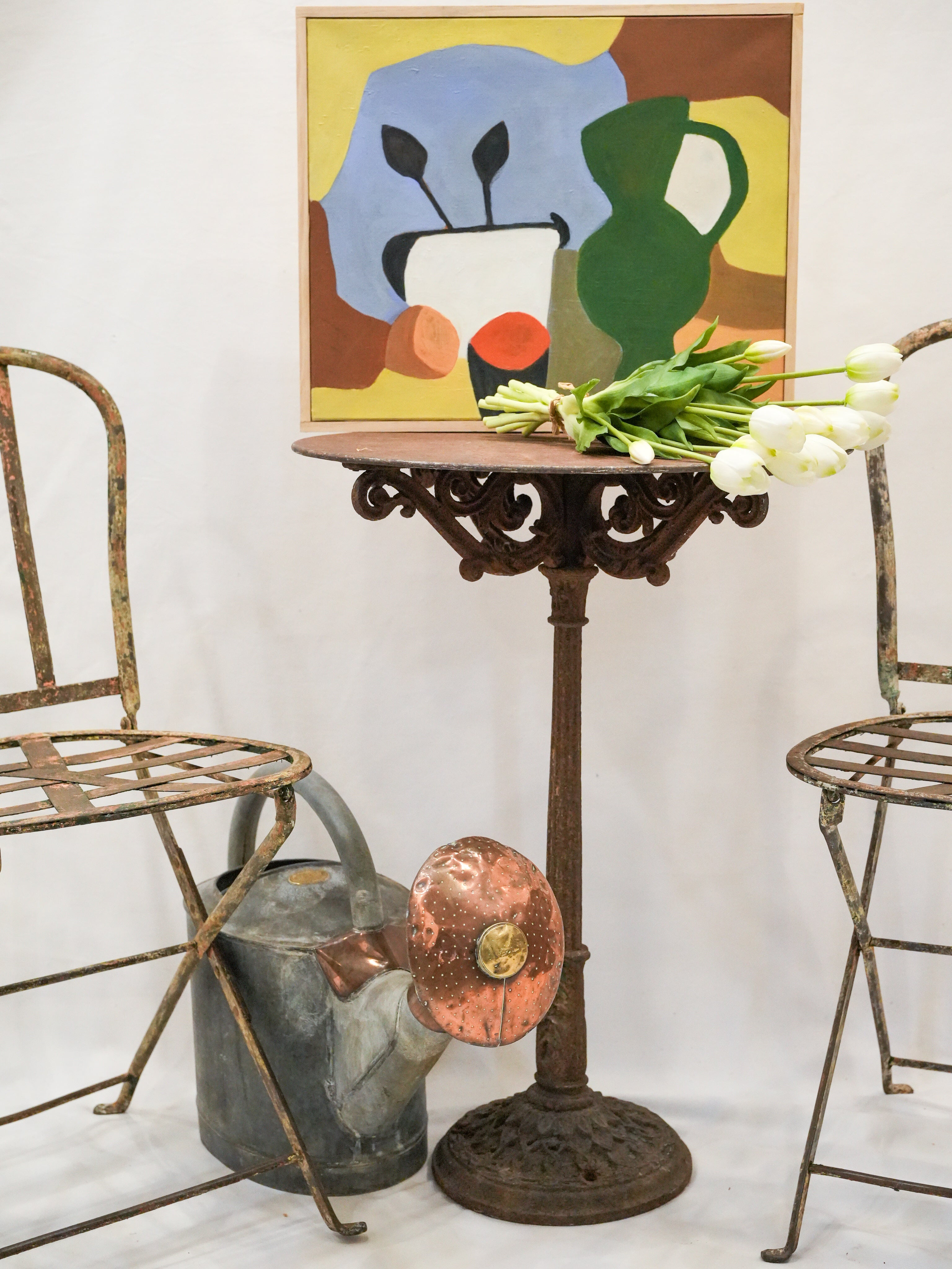 Weathered metal round patio table