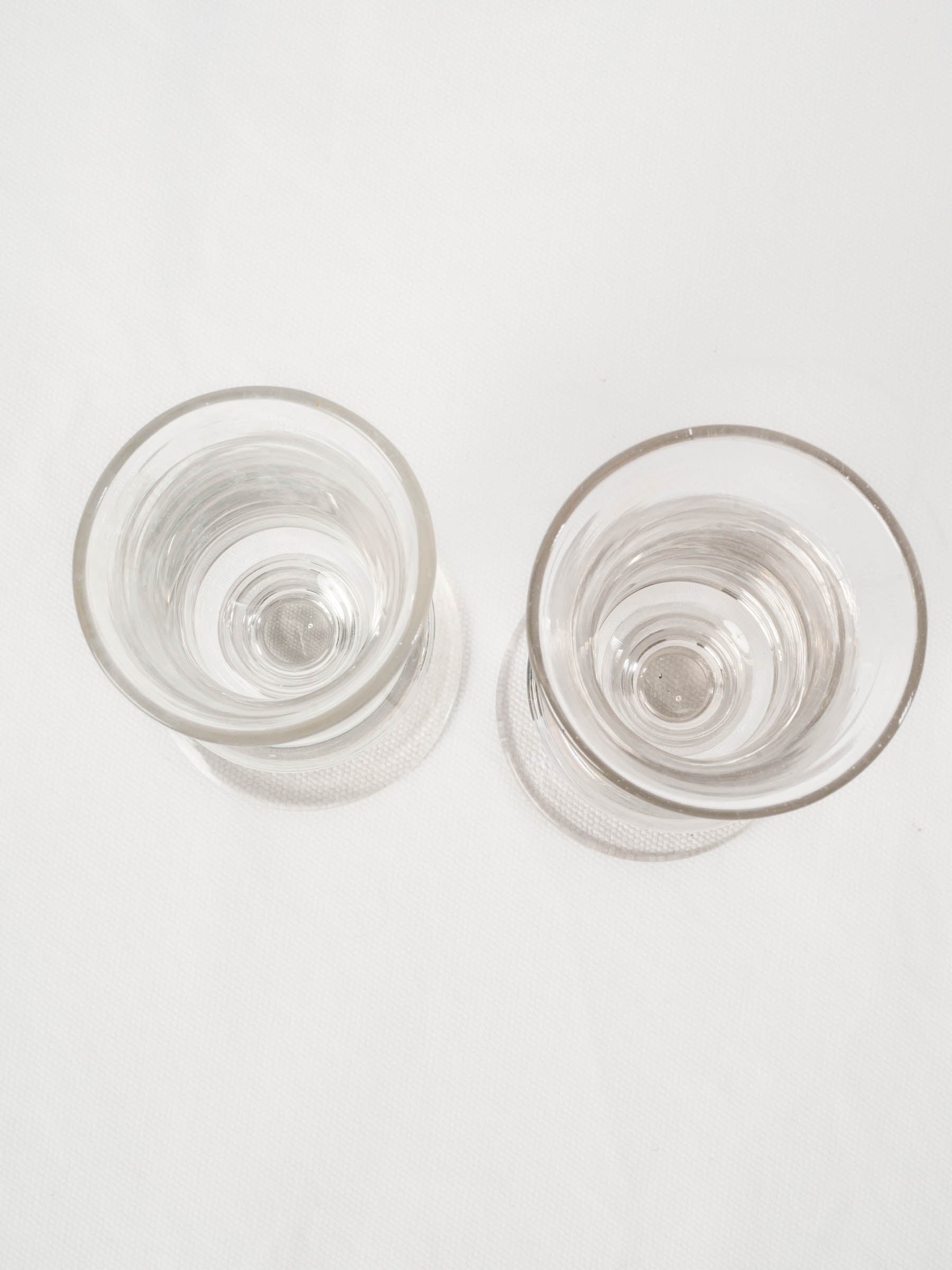 Near pair of French antique blown glass absinthe bistro glasses