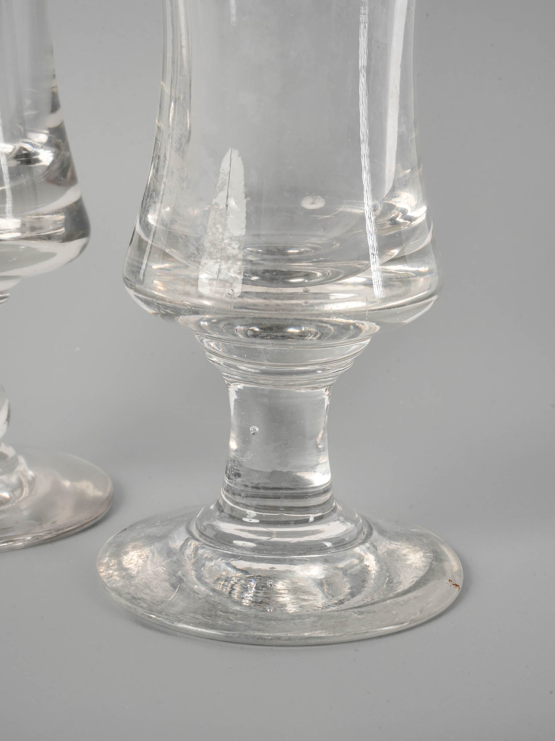Near pair of French antique blown glass absinthe bistro glasses