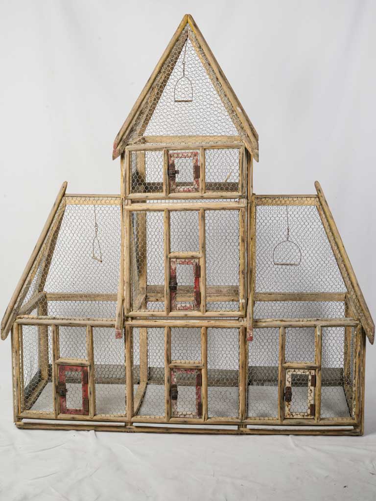 Handcrafted rustic church-like aviary