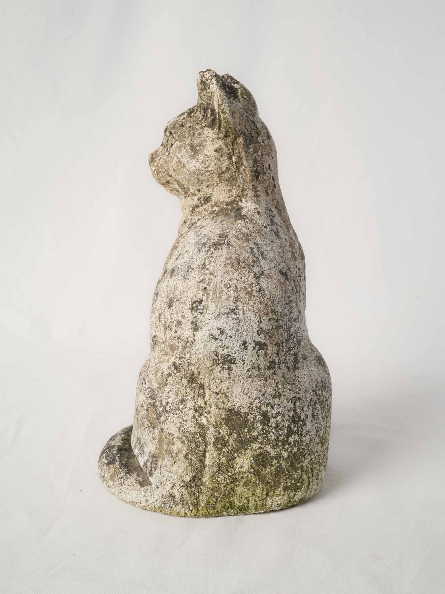 Rustic mottled stone feline sculpture